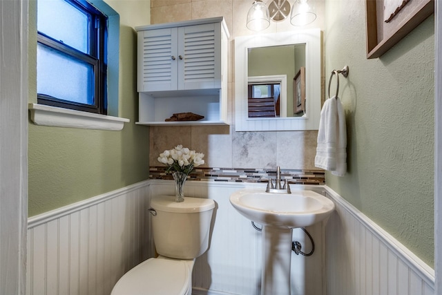 bathroom featuring sink and toilet