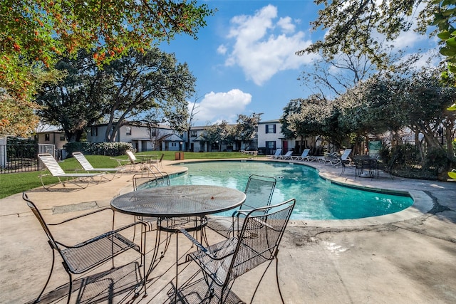 view of pool featuring a patio area