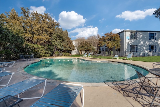 view of pool featuring a patio