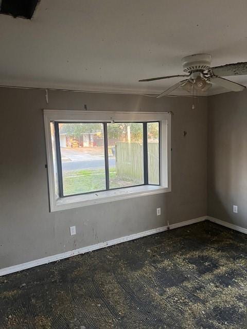 empty room featuring ceiling fan