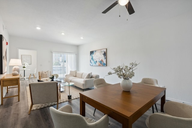 living room with hardwood / wood-style floors and ceiling fan