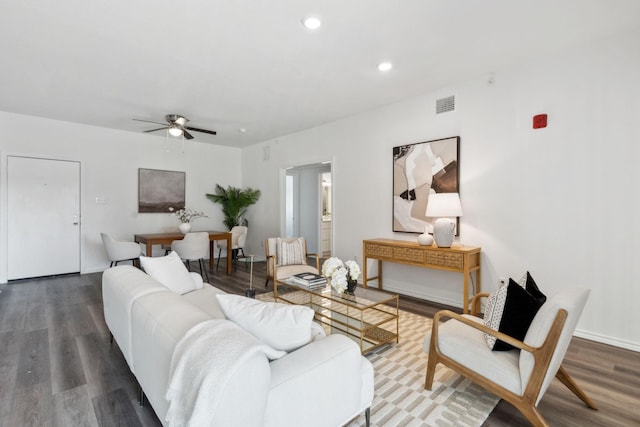 living room with hardwood / wood-style floors and ceiling fan