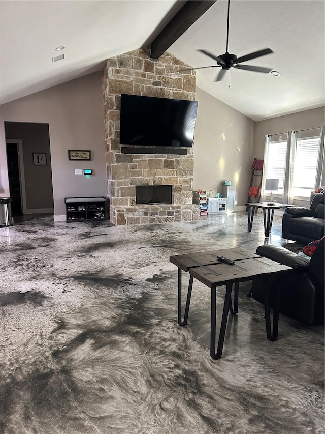 living room with a stone fireplace, lofted ceiling with beams, and ceiling fan