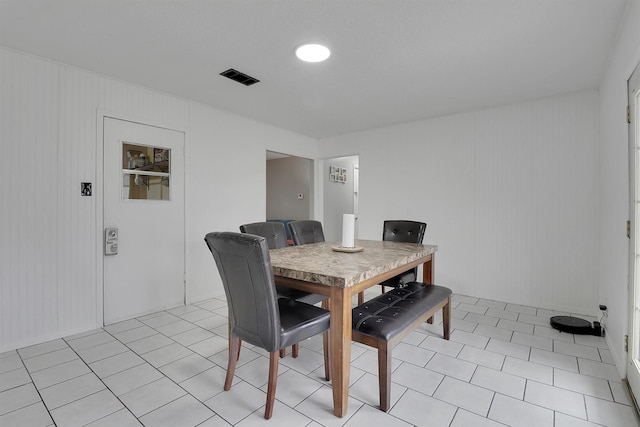 321 Bowles Ct, Kennedale, TX 76060 - dining room with visible vents and light tile patterned floors