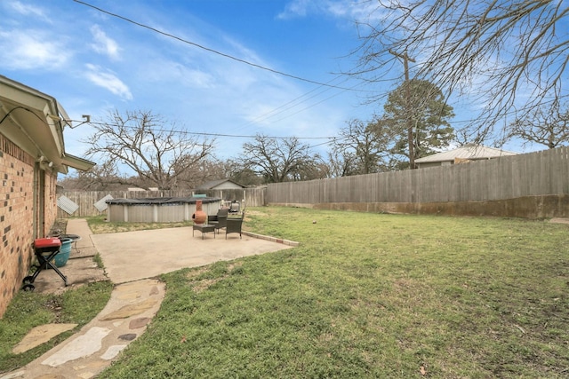 321 Bowles Ct, Kennedale, TX 76060 - view of yard with a fenced backyard and a patio