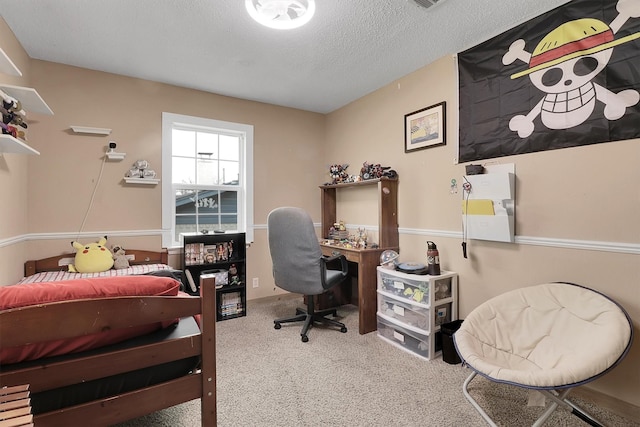 carpeted office with a textured ceiling