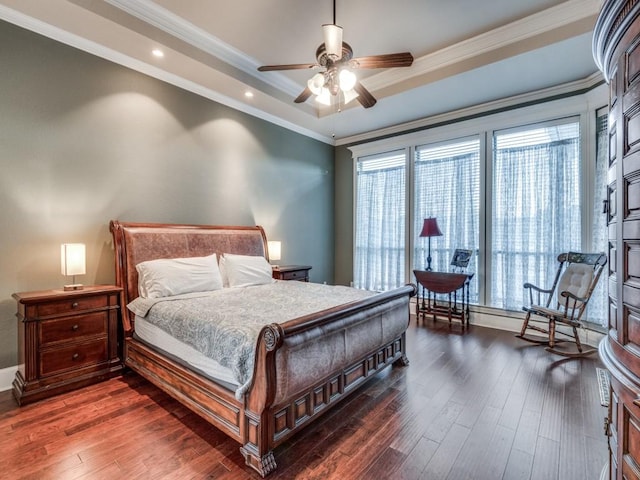 bedroom featuring multiple windows, crown molding, and ceiling fan