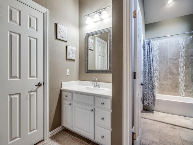 bathroom with vanity, tile patterned flooring, and shower / bath combo with shower curtain