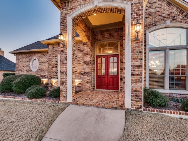 exterior entry at dusk with french doors