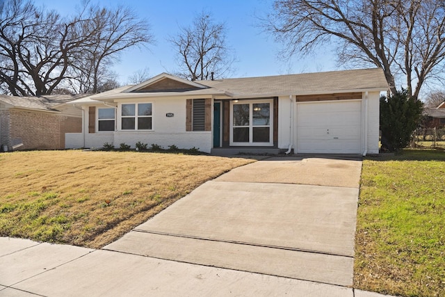 single story home with a garage and a front yard