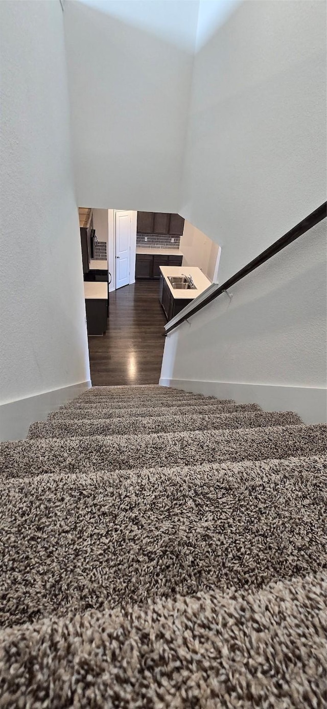 stairway with wood-type flooring