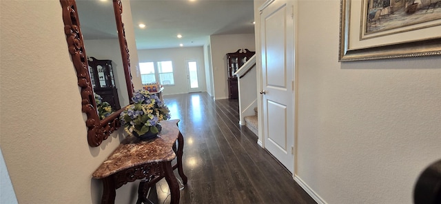 hallway featuring dark hardwood / wood-style floors