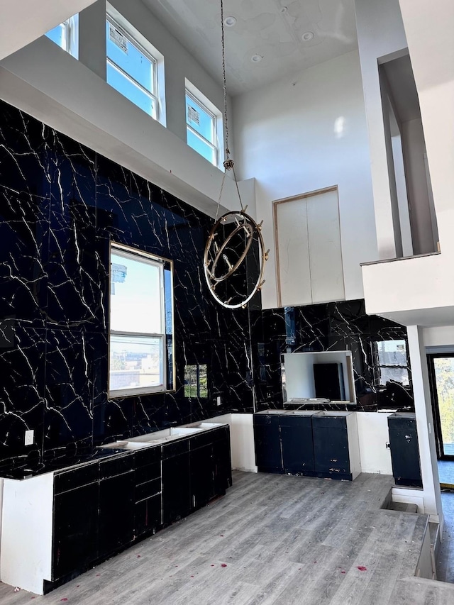 kitchen with a towering ceiling