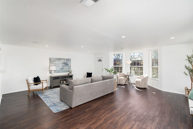 kitchen featuring sink, kitchen peninsula, white cabinets, and appliances with stainless steel finishes