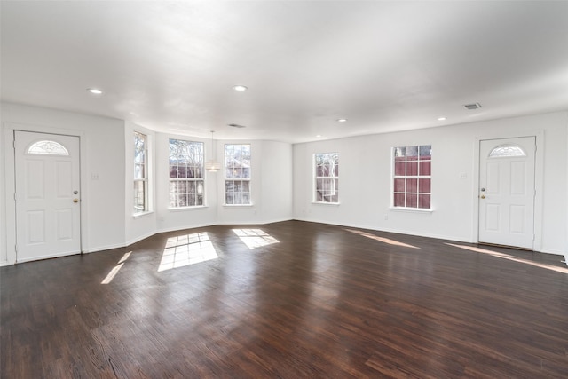 foyer entrance featuring dark hardwood / wood-style flooring