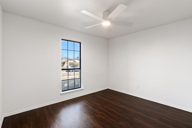 spare room featuring ceiling fan and wood-type flooring