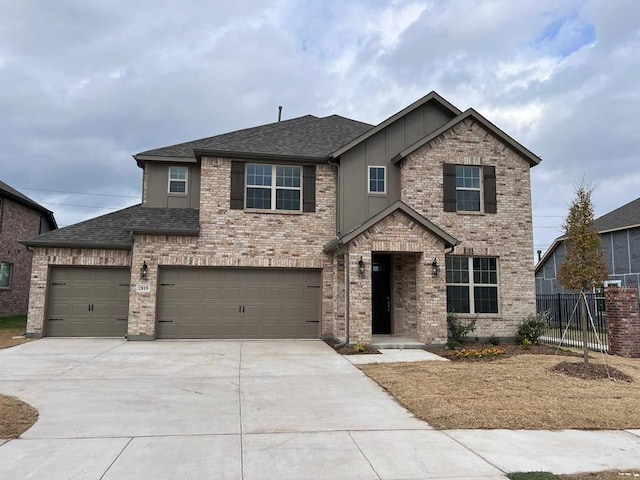 view of front of property with a garage