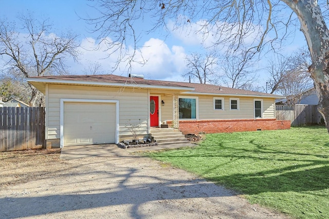 single story home featuring a garage and a front yard