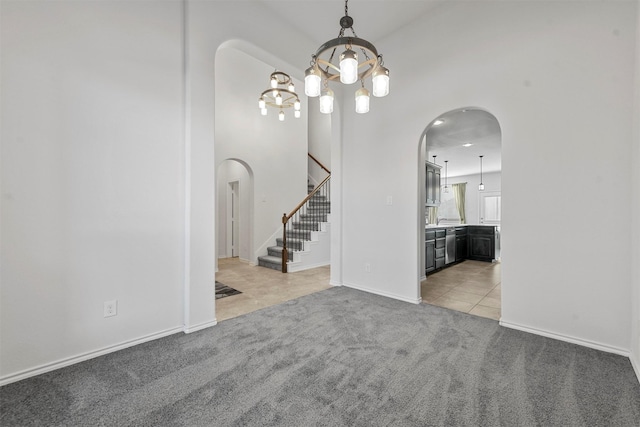 unfurnished living room with light carpet