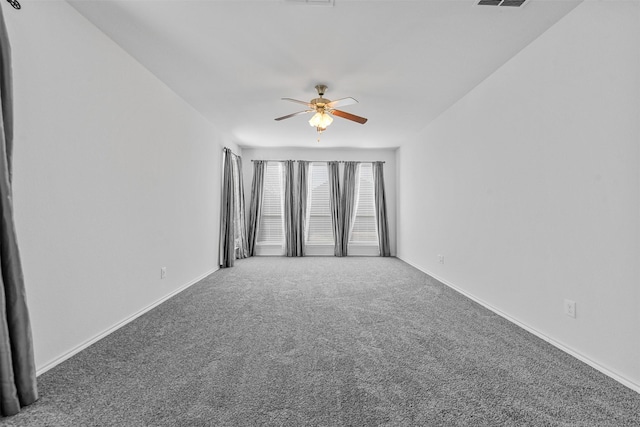 carpeted empty room with ceiling fan