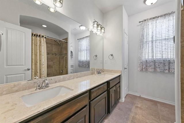 bathroom with vanity and a shower with shower curtain