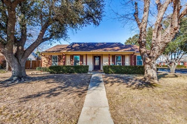 ranch-style house with a front yard