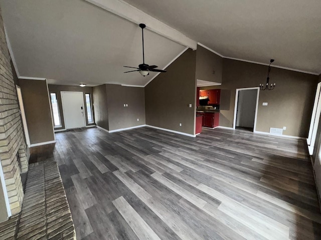 unfurnished living room with ceiling fan with notable chandelier, ornamental molding, dark hardwood / wood-style flooring, and lofted ceiling with beams