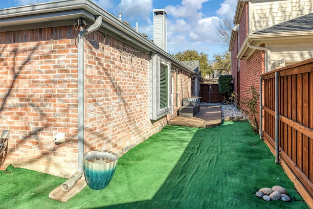 view of home's exterior with a yard