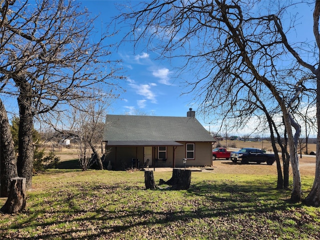 view of front of property with a front lawn