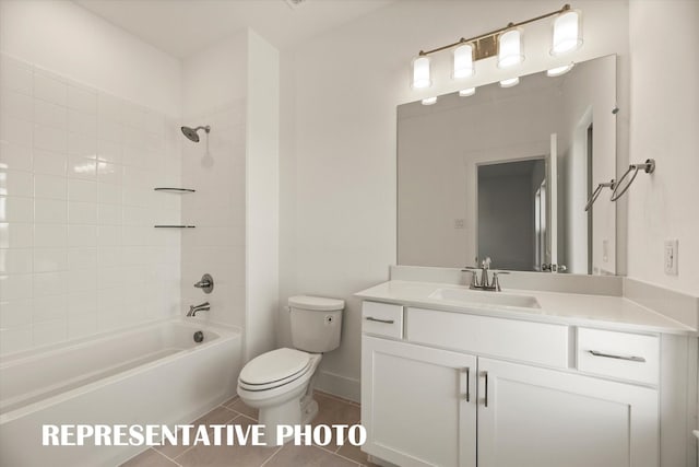 full bathroom with tiled shower / bath combo, vanity, tile patterned floors, and toilet