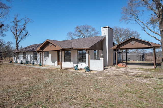 view of front of home featuring a gazebo and a front yard