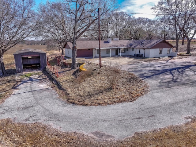 single story home with a garage