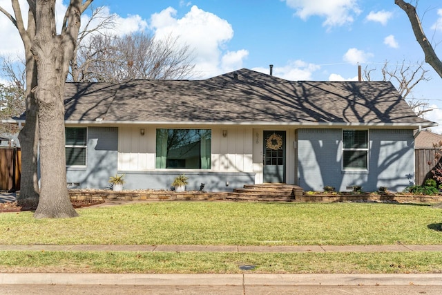 ranch-style house with a front yard