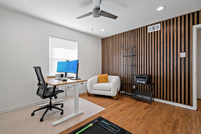 office area featuring wood-type flooring and ceiling fan