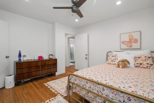 bedroom featuring dark wood-type flooring and ceiling fan