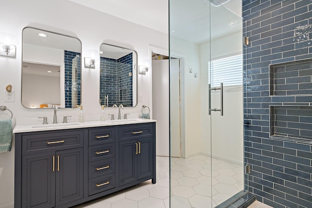 bathroom with tile patterned flooring, vanity, and an enclosed shower