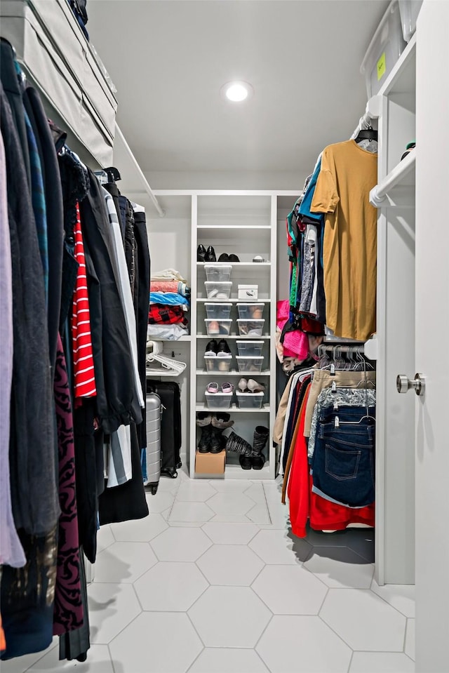 spacious closet with tile patterned flooring