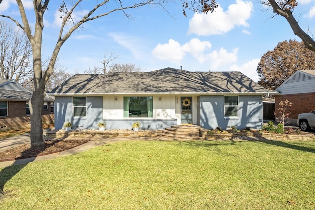 ranch-style house featuring a front lawn