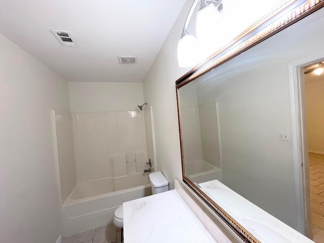 full bathroom featuring tile patterned floors, vanity, toilet, and shower / bath combination