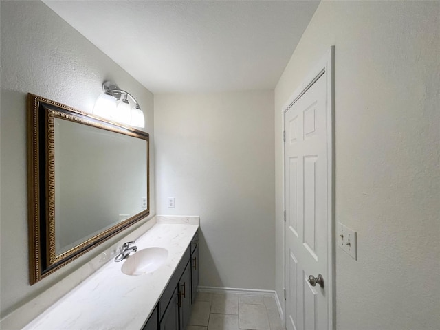 bathroom featuring vanity and tile patterned flooring