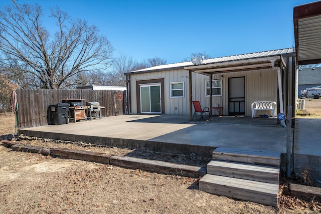 rear view of property with a patio