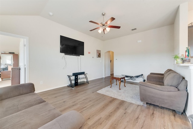 living room featuring lofted ceiling, light hardwood / wood-style floors, and ceiling fan