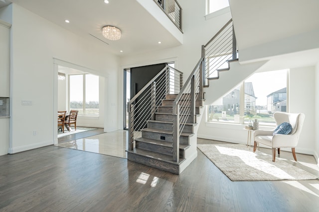 staircase featuring hardwood / wood-style floors