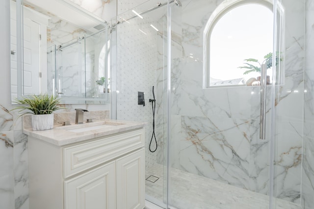 bathroom with vanity and an enclosed shower