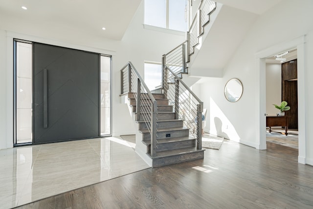 foyer entrance with hardwood / wood-style floors