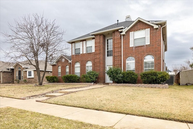 view of front of property featuring a front yard