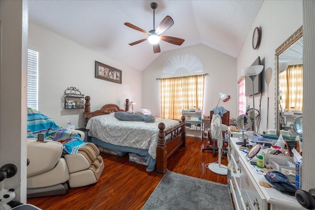 bedroom featuring ceiling fan, lofted ceiling, dark hardwood / wood-style floors, and a textured ceiling