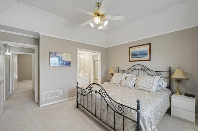 carpeted bedroom featuring ornamental molding, connected bathroom, and ceiling fan