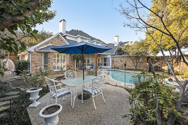 view of pool with a patio area