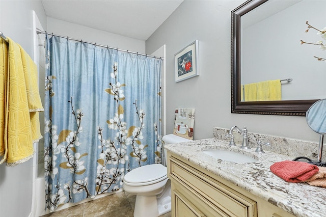 full bathroom featuring vanity, shower / tub combo, and toilet